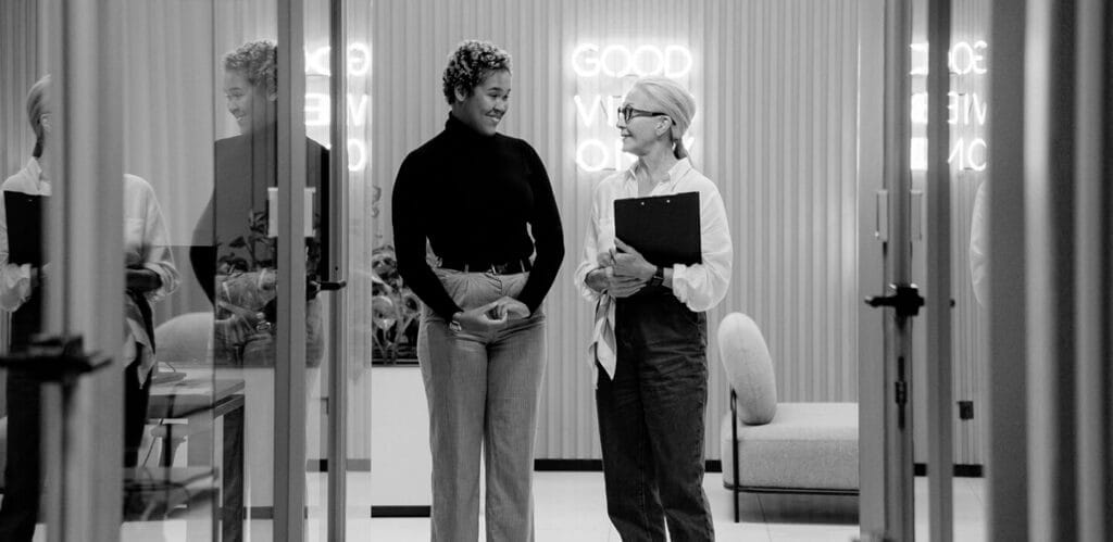 Employer and employee talking in a retail store